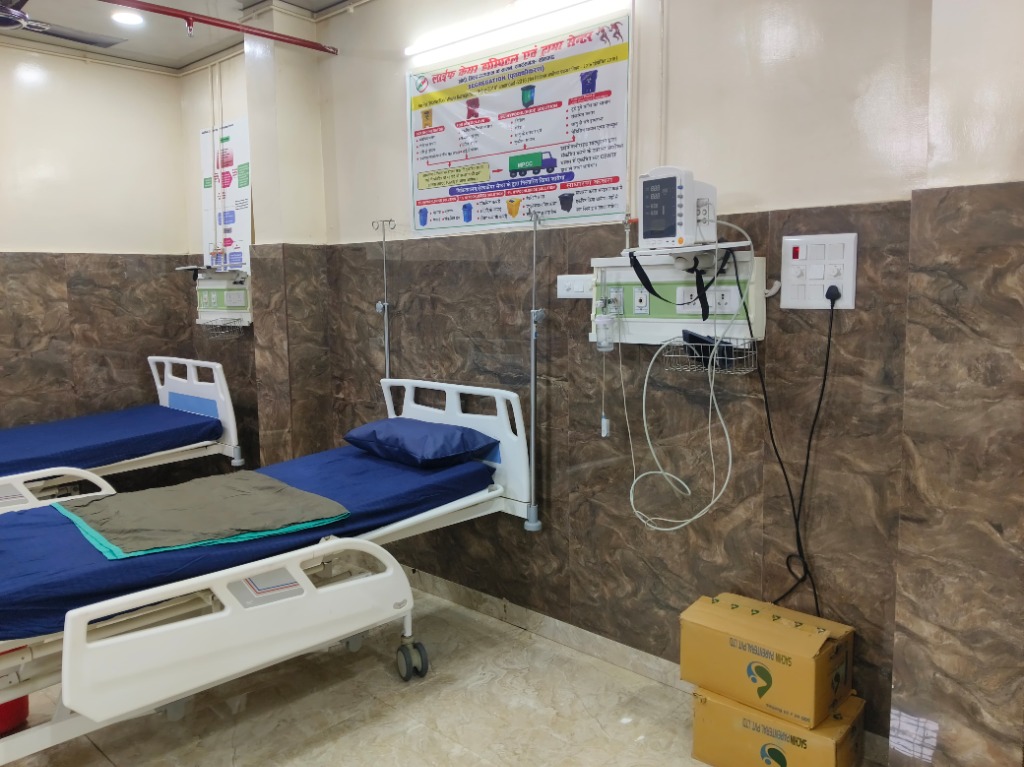 Clean Deluxe Room Blue Beds Waste Segregation Life Care Hospital